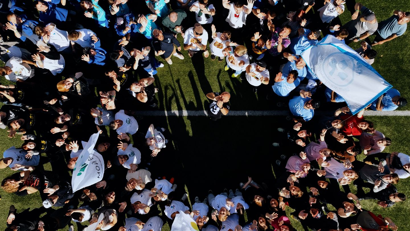 Camp participants in a circle, view from above